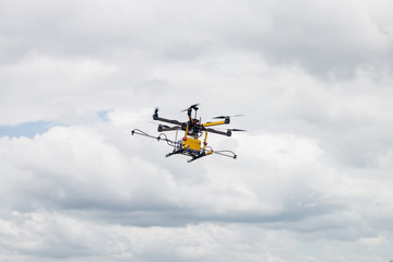 Fototapeta na wymiar agriculture drone fly on sky and farm field