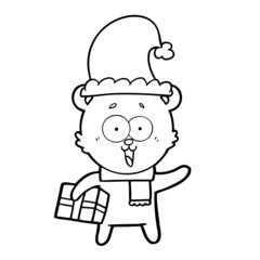 laughing teddy  bear with christmas present