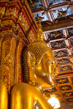 Buddha image in church of Wat Phumin, Nan, Thailand