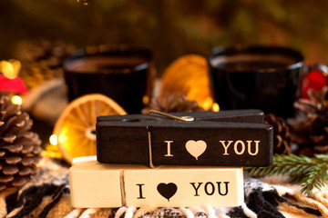 Two cups of coffee, cones, orange cucumbers. Christmas and New Year. Happy valentines day concept.