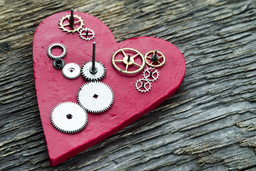 Gears on the background of the heart.
