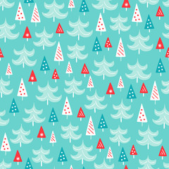 Obraz premium Christmas seamless pattern with fir trees on blue background