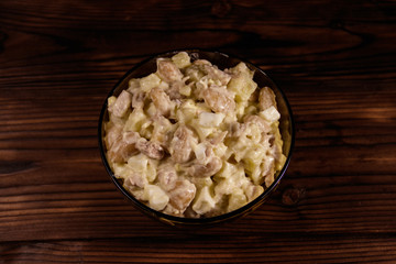 Salad with white kidney beans, potatoes, chicken meat, eggs and mayonnaise