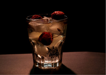 cocktail in the glass with ice cubes