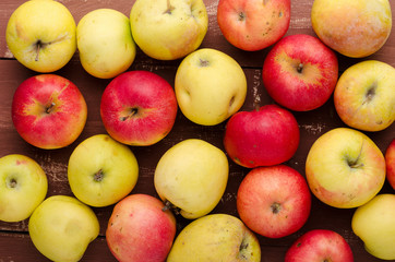Fresh apple on brown wooden table. Fresh fruits on background. Healthy food.