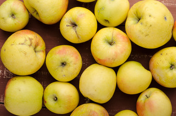 Fresh apple on brown wooden table. Fresh fruits on background. Healthy food.