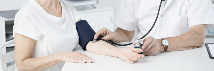 Doctor measuring pressure