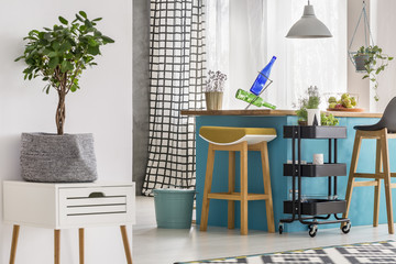 White cabinet with tree