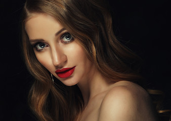 Fototapeta premium Blonde fashion girl with long and shiny curly hair. Red lips and