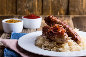 Sausages  and sauerkraut with caramelize onions