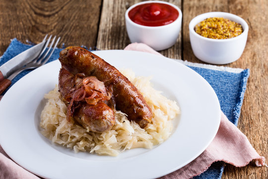 Sausages  and sauerkraut with caramelize onions