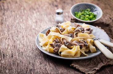 Pasta tagliatelle  with  mushrooms