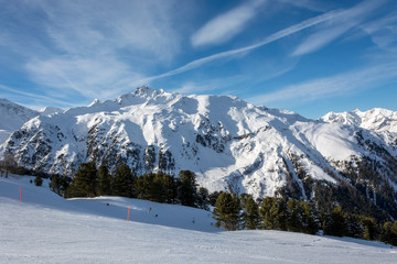 Fototapeta premium Slope in ski resort Serfaus Fiss Ladis in Austria with snowy mountains