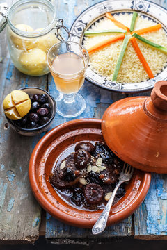 Slow cooked beef with prunes, figs, raisins and almonds - moroccan tajine.