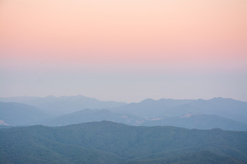 Aerial view landscape mountain and forest at twilight from Doi Samer Dao  in Sri Nan National Park ,  Nan Province of Thailand