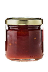 Hot chili sauce in glass on white background