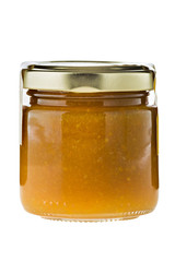 Hot mango chili sauce in glass on white background