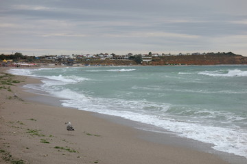 Empty beach in Vama Veche, Romania in cloudy weather