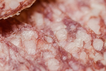 Close up of sliced salami. Background