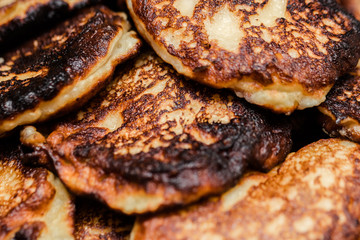 Сlose up of traditional Russian curd pancakes (syrniki)