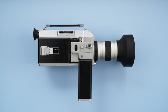 Super 8 Movie Film Camera on Blue Background