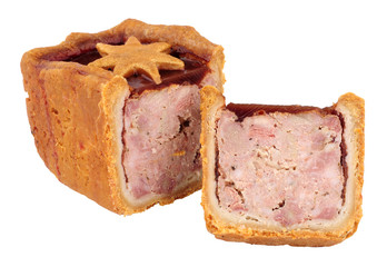 Cranberry sauce topped pork pie decorated with a pastry star isolated on a white background