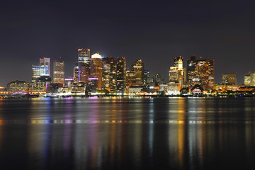 Fototapeta na wymiar Boston City Skyscrapers, Custom House and Boston Waterfront at night from East Boston, Boston, Massachusetts, USA.