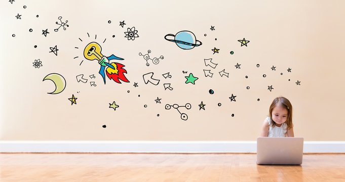 Idear Rocket with little girl using a laptop computer on floor