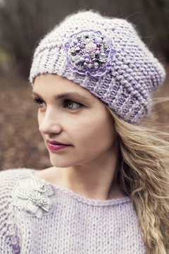 Woman portrait in knitted hat