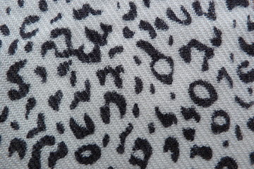 motley colored fabric scarf dress close-up background for design background textile cloth clothes vintage natural fabric flax cotton wool abstract illustration white-black leopard print drawing