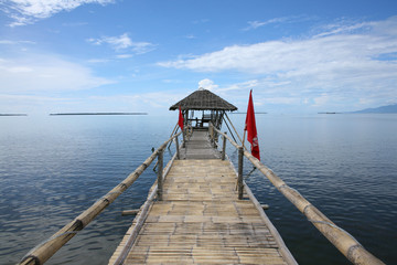 Naklejka premium Traditional pier structure over the ocean in the Philippines