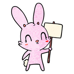 cute cartoon rabbit with sign