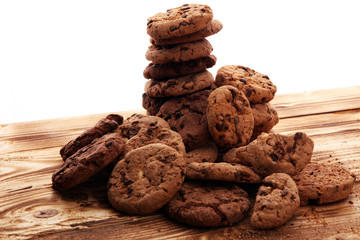 Chocolate cookies on wooden table. Chocolate chip cookies shot