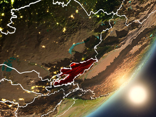 Sun rising above Kyrgyzstan from space