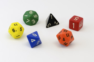 Pile of colorful roleplaying polyhedral dices isolated over the white background frp