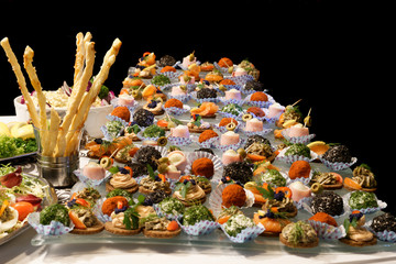 Exquisite snacks arranged on the table.
