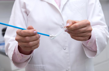 Gynecology consultation. Doctor taking analysis of Vaginal Smear
