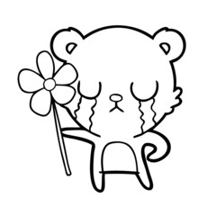 crying cartoon bear with flower