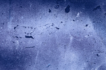 old blue wall background or texture