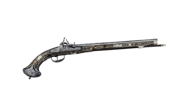 Ancient pistol or musket on a white background.