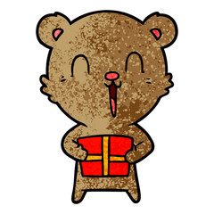happy cartoon bear with christmas gift