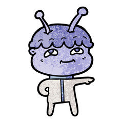 friendly cartoon spaceman pointing