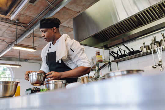 Chef cooking food in a commercial kitchen