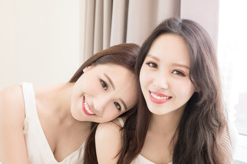 two beauty woman in home