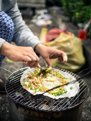 Handmade Vietnamese street food over coals