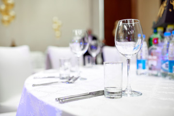 Wine-glass and glass on the table