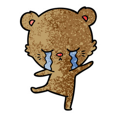 crying cartoon bear balancing