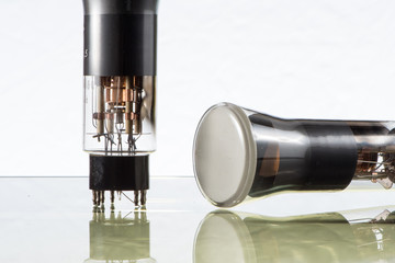 Closeup of two old electronic vacuum tubes