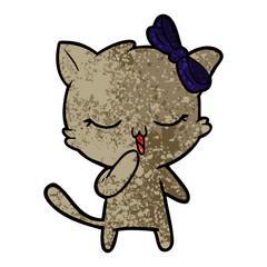 Obraz na płótnie Canvas cartoon cat with bow on head