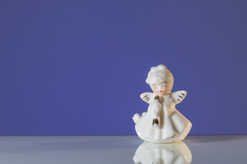 Closeup of an angel made of porcelain